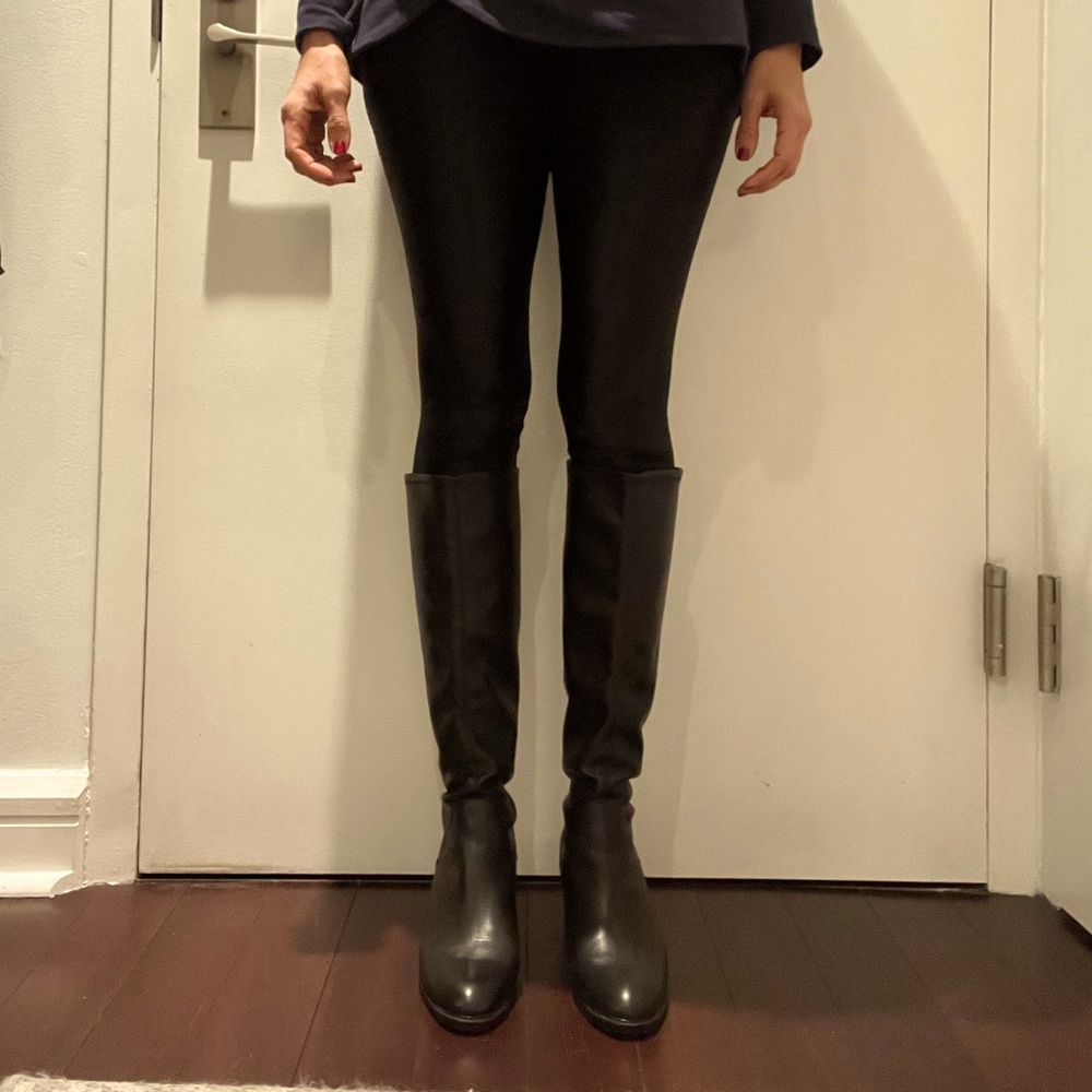 Donald J Pliner women’s black leather tall riding boot style.